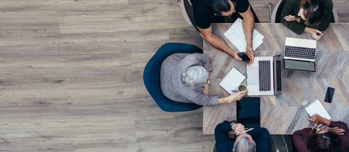 Professionals in meeting space